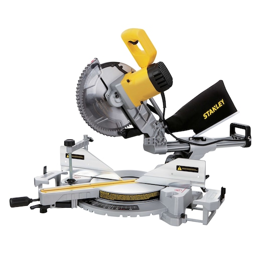 Photo of STANLEY SM18-B2C miter saw with yellow handle, silver blade, and black dust bag, side angle view.